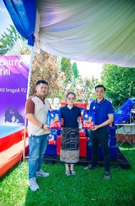 Sponsor giving dog food